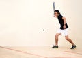 Man, squash player or racket to hit ball in indoor court game for fitness, cardio training or exercise. Workout Royalty Free Stock Photo
