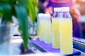 Man squeezes a sugar cane to make fresh, organic juice with a hand powered juicer. Healthy product Royalty Free Stock Photo