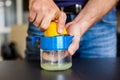 Man squeezing lemon juice closeup Royalty Free Stock Photo