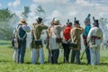 Man Squints during Firing of Muskets