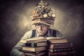 Man with a stack of books and clock on his head, contemporary art collage Royalty Free Stock Photo