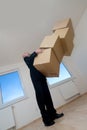 Man with stack of boxes
