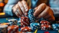 Man stacking poker chips on casino table, close-up. Gambling and casino concept Royalty Free Stock Photo