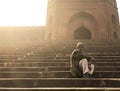Man on Stairs Outside Jama Masjid, Old Delhi, India