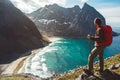 Man stand on cliff edge alone enjoying aerial view backpacking lifestyle travel adventure outdoor vacations Royalty Free Stock Photo