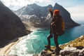 Man stand on cliff edge alone enjoying aerial view backpacking lifestyle travel adventure outdoor vacations Royalty Free Stock Photo