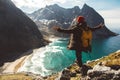 Man stand on cliff edge alone enjoying aerial view backpacking lifestyle travel adventure outdoor vacations Royalty Free Stock Photo