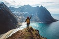 Man stand on cliff edge alone enjoying aerial view backpacking lifestyle travel adventure outdoor vacations Royalty Free Stock Photo