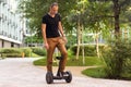 man stand near segway hoverboard Royalty Free Stock Photo