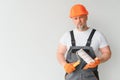 Man stand in the room with paint roller in his hand Royalty Free Stock Photo