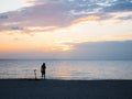 A man is standing alone, contempling the beautiful sunset in Miami beach, Florida, USA Royalty Free Stock Photo