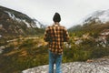 Man standing alone in foggy forest mountains enjoying view Royalty Free Stock Photo