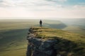 A man standing alone on mountain peak Royalty Free Stock Photo