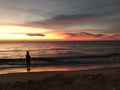 A man standing alone watching the scenery after the sunset at Ko Kut in Trat, Thailand. Royalty Free Stock Photo