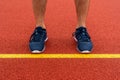 Man standing behind the yellow line in the sports ground Royalty Free Stock Photo