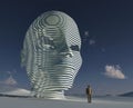 Man standing before big mystical head