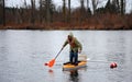 Man Standing in Canoe Royalty Free Stock Photo
