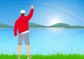 Man standing with cheerful with fists raised up beside the lake with sunrise with rainbow background, success, achievement concept