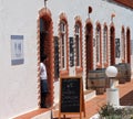 Man In Doorway Of A Restaurant At Praia Do Barril Tavira Portugal