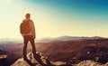 Man standing at the edge of a cliff Royalty Free Stock Photo