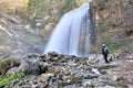 Man looking waterfall in mountain