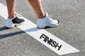 Man standing on finish line