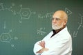 Man standing in front of a blackboard Royalty Free Stock Photo