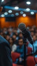 A man standing in front of a microphone with an audience, AI