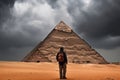 a man standing in front of a pyramid. Generative Ai Royalty Free Stock Photo