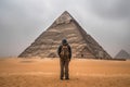 a man standing in front of a pyramid in the. Generative Ai Royalty Free Stock Photo