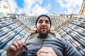 Man standing in front of San Lorenzo cathedral in Genoa, Italy - looking strange