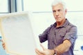 Man standing in a gallery and contemplating Royalty Free Stock Photo