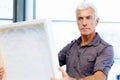 Man standing in a gallery and contemplating Royalty Free Stock Photo