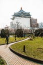 A man standing in the garden in the back of the renovation period of National Chiang Kai-shek Memorial Hall in Taipei, Taiwan Royalty Free Stock Photo