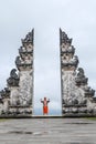 Man is standing in the gate of Lempuyang temple on Bali isalnd, Indonesia Royalty Free Stock Photo