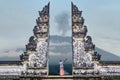 Man is standing in the gate of Lempuyang temple on Bali isalnd, Indonesia Royalty Free Stock Photo