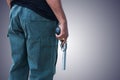Man standing and hand holding gun revolver Royalty Free Stock Photo