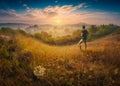 Man standing on a hill in a high graass Royalty Free Stock Photo