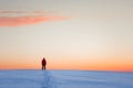 Man standing on hill waiting for sunrise Royalty Free Stock Photo