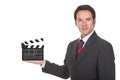 Man standing and holding clapboard on his hand Royalty Free Stock Photo