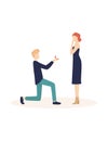 Man standing on knee and making marriage proposal, holding ring.