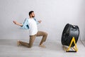 Man standing on knee near electric Royalty Free Stock Photo