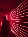 A man standing between the lasers of the audiovisual installation a.r.r.c. by Dreamlaser studio from Novgorod at the Prague Signal