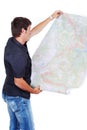 Man standing and looking at maps Royalty Free Stock Photo