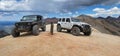Man standing in the middle of two Jeeps in Imogene Pass near Telluride Royalty Free Stock Photo