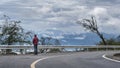 A man standing by the mountain road Royalty Free Stock Photo