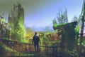 Man standing on old bridge in overgrown city Royalty Free Stock Photo