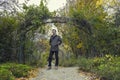 Man standing in park in fall season / autumn