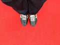 Man standing on red carpet. close up of foot Royalty Free Stock Photo