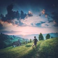 Man standing on a road and enjoy sunrise. Instagram stylization